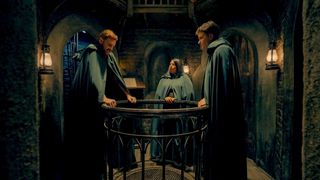 Paul, Ash, and Harry wearing their cloaks in the Traitors' Turret The Traitors season 2