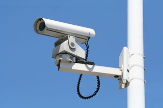 CCTV security camera on a pole
