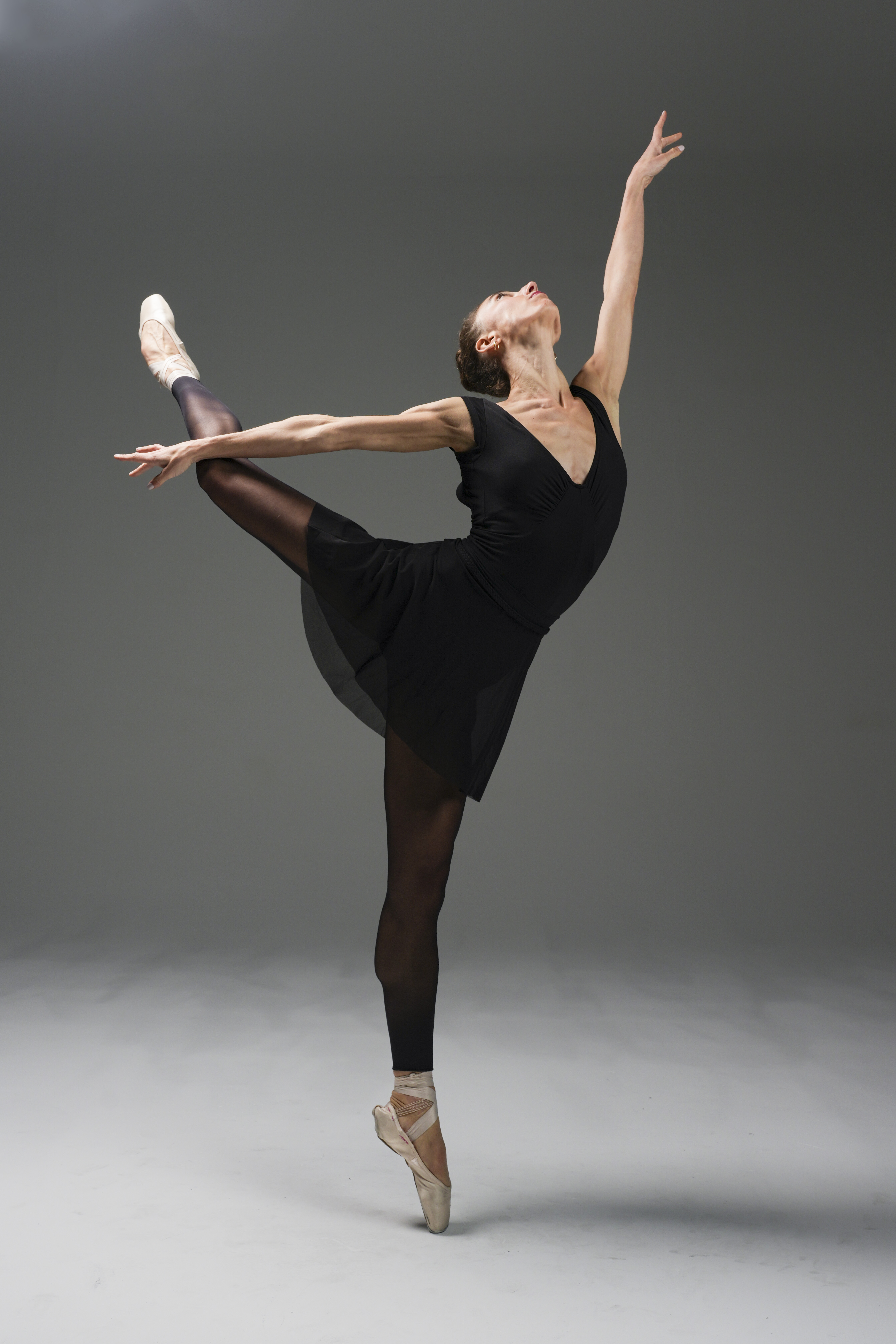 Ballet dancer in a white studio