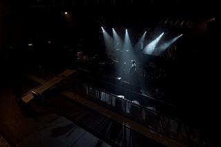 A great snap of Matt during soundcheck, in some smoke that isn't his own.