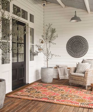 large pattern rug from weaver green in porch