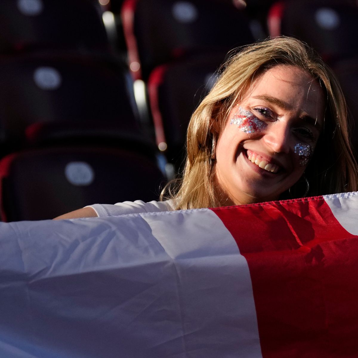 A female fan watching the England vs Spain Women&#039;s Euros final in Switzerland