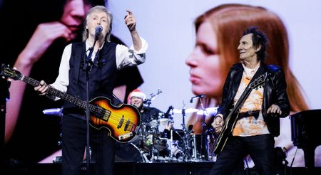 Paul McCartney and Ronnie Wood play the Beatles classic Get Back onstage at the O2 in London