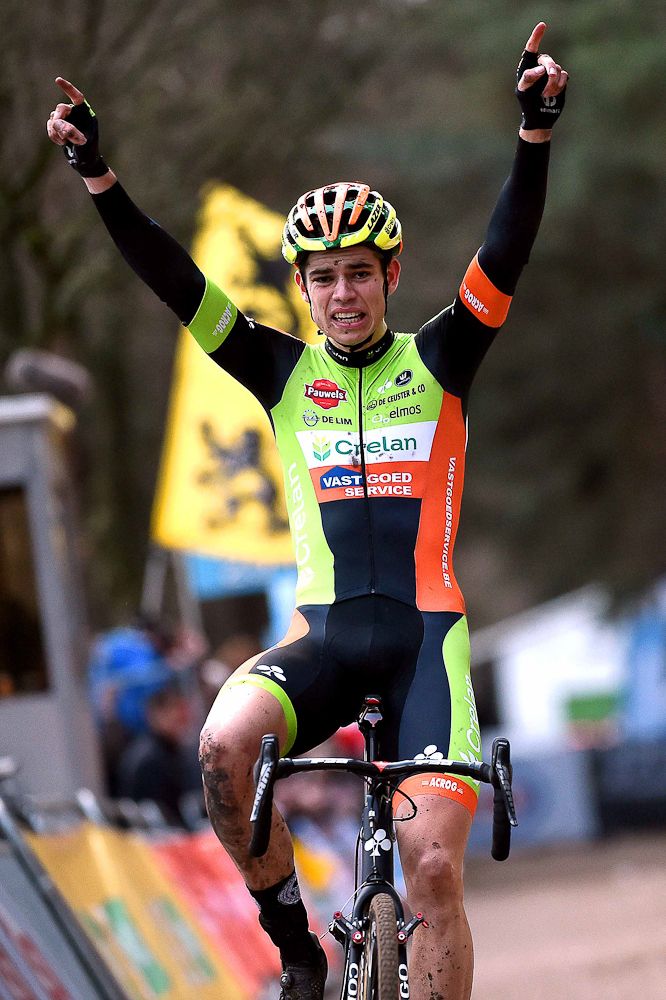 Wout van Aert celebrates his title as he crosses the finish.