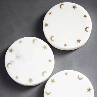 Celestial Coasters on a gray table