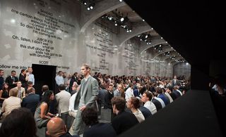 S/S 2010 menswear: This show featured a text-covered, perforated wall, set between the audience and the catwalk