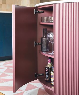 Curvaceous, fluted pink cabinet