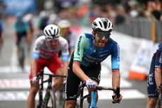 COMO ITALY OCTOBER 12 Larry Warbasse of The United States and Decathlon AG2R La Mondiale Team crosses the finish line during the 118th Il Lombardia 2024 a 255km one day race from Bergamo to Como UCIWT on October 12 2024 in Como Italy Photo by Tim de WaeleGetty Images