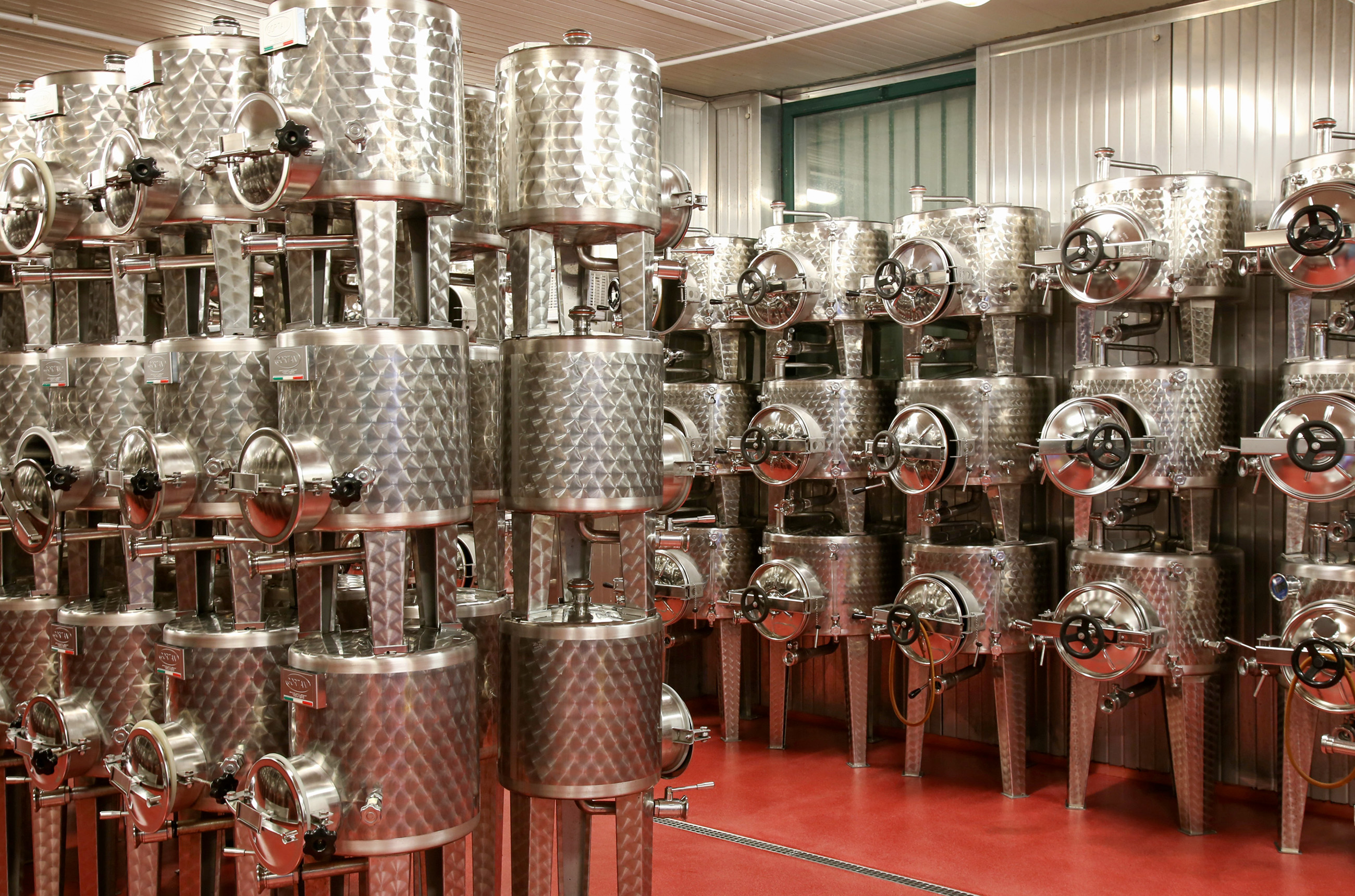 Microvinification vats in cellar