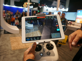 The DJI Inspire 1 controller, with attached tablet running the DJI app, at CES 2015.