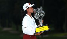 Celine Boutier kiss the Maybank Championship trophy