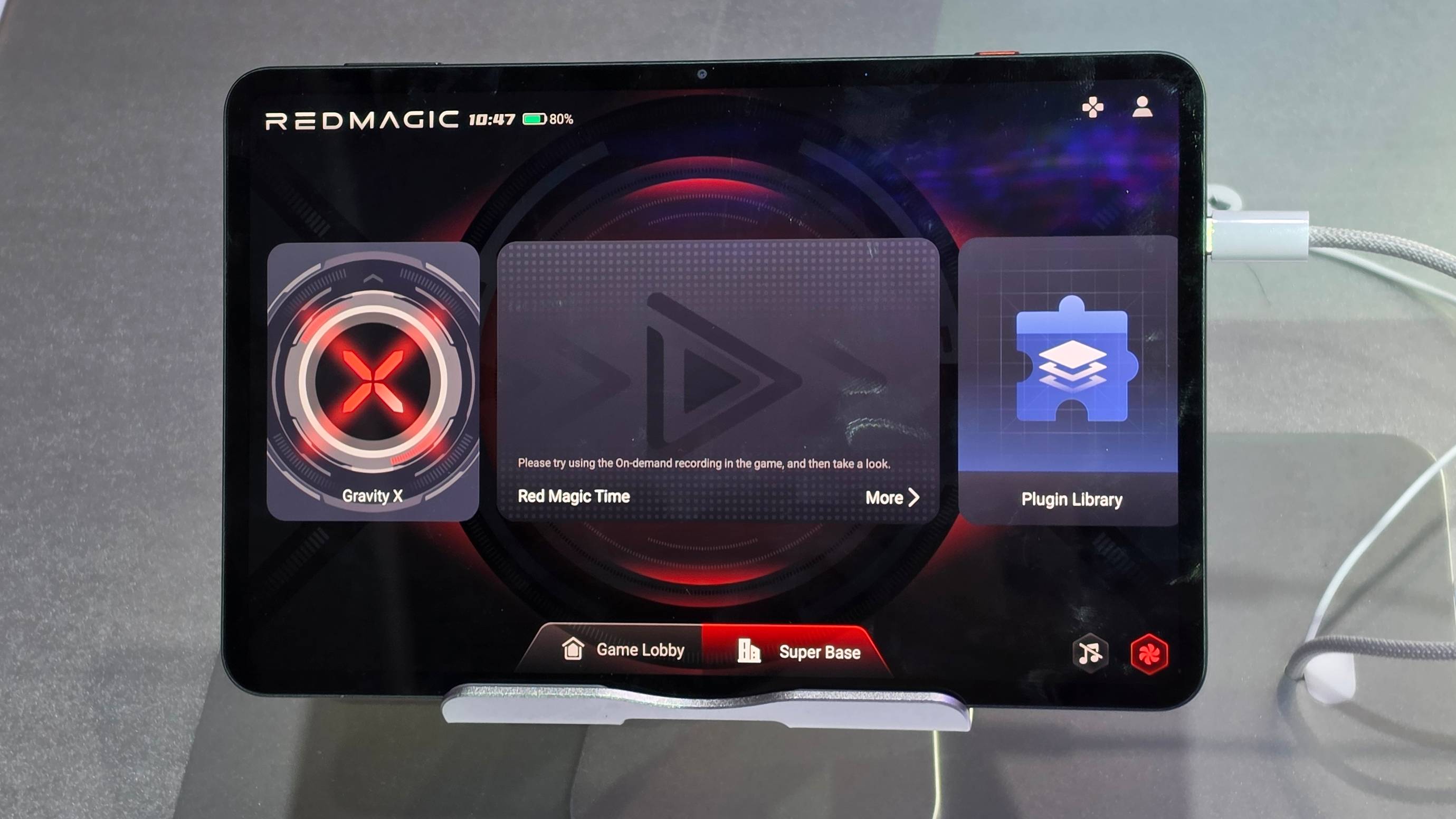 The Nubia Red Magic Astra on a stand, in gaming mode.