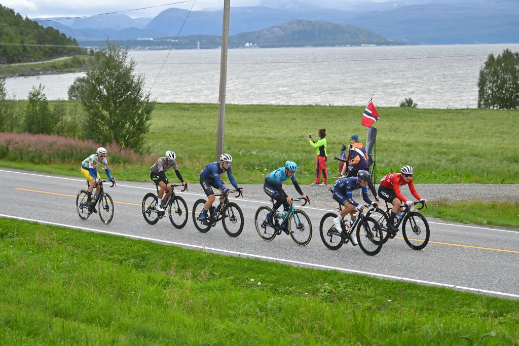 HAMMERFEST NORWAY AUGUST 18 Peder Antoni Gravs of Norway and Team Norway Gianmarco Garofoli of Italy and Astana Qazaqstan Team Vincent Van Hemelen of Belgium and Team FlandersBaloise Johan Ravny of Norway and Team CoopRepsol Camilo Andres Gomez Gomez of Colombia and Team Trinity Racing and Ronan Aug of France and Team GroupamaFDJ Continental compete in the breakaway during the 10th Arctic Race of Norway Stage 2 a 1534km stage from Alta to Hammerfest on August 18 2023 in Hammerfest Norway Photo by Luc ClaessenGetty Images