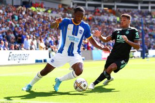 Enock Mwepu of Brighton & Hove Albion is challenged by James Justin of Leicester City during the Premier League match between Brighton & Hove Albion and Leicester City at American Express Community Stadium on September 04, 2022 in Brighton, England.