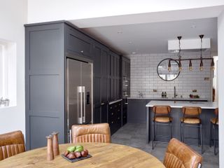 kitchen diner with dark interiors by Higham Furniture