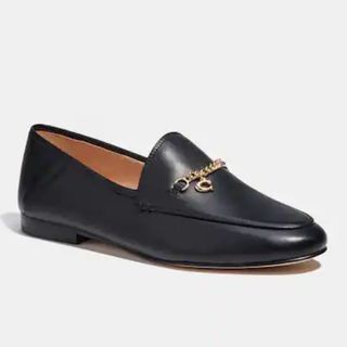 black leather loafers with gold chain and C detail