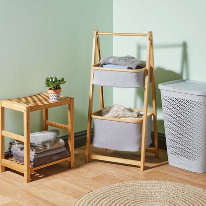 room with bamboo storage rack and wooden flooring