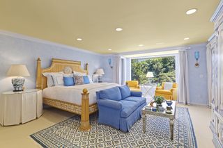 Blue and yellow bedroom in Long Island home