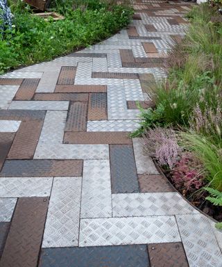 unique metal path with edging at chelsea 2021