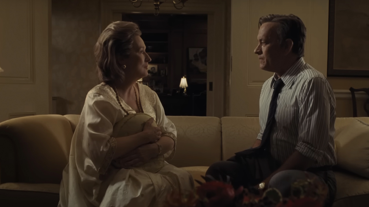 Meryl Streep and Tom Hanks facing each other, sitting on a couch