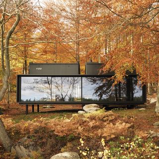 vipp shelter black pod with glass walls and ceiling
