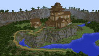 A Minecraft mansion perched on a cliffside surrounded by a lake.
