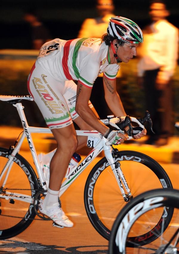 Filippo Pozzato out of the saddle in Oman