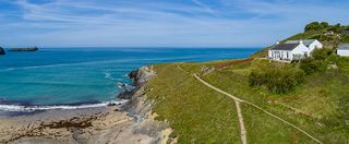 Via Savills in Truro: For sale at a guide price of £2 million is Polbream, in Mullion, some eight miles south of Helston. This extended former farmhouse sits on its own headland, Polbream Point