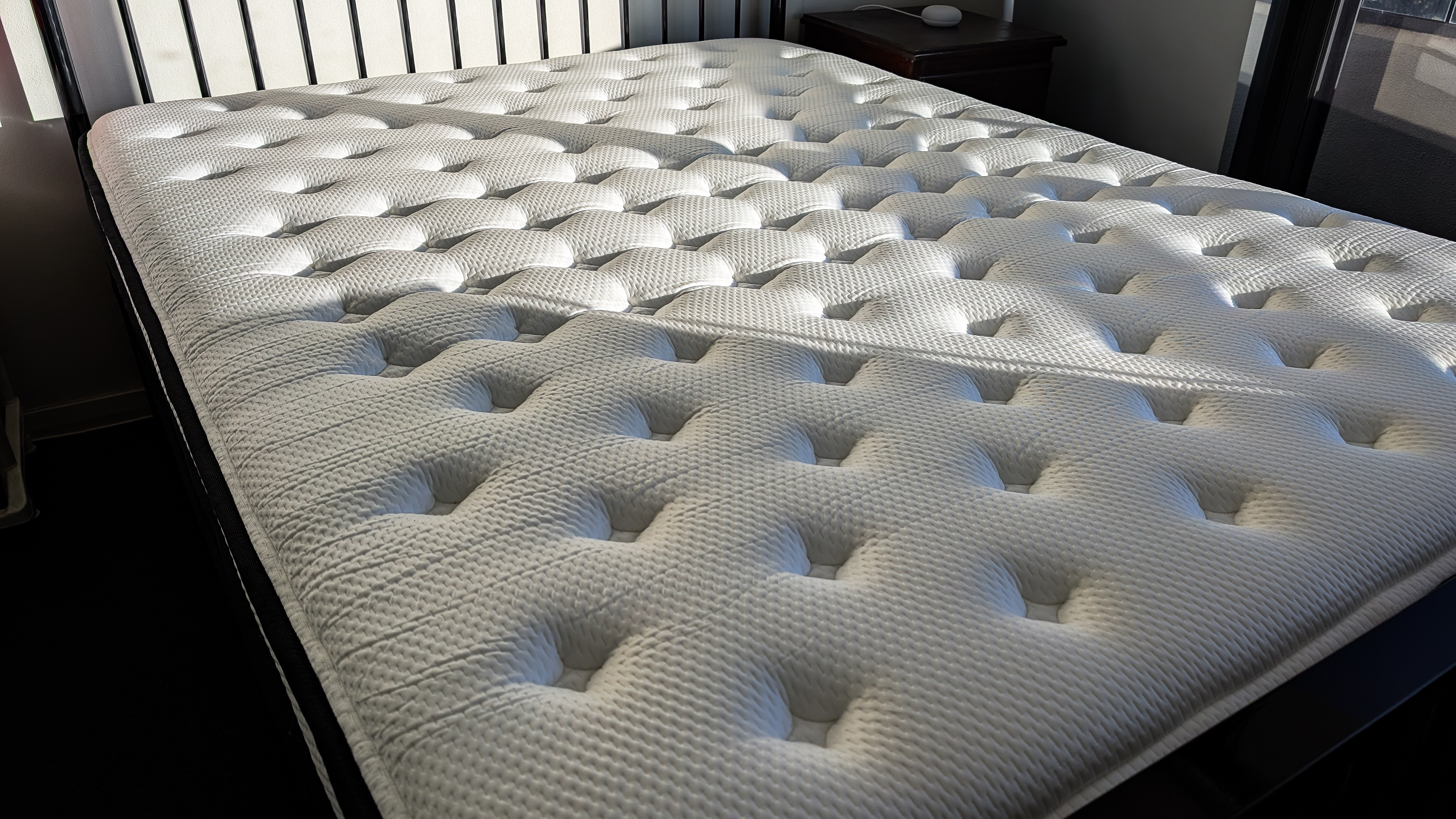 Origin LumbarCloud mattress on a bed frame