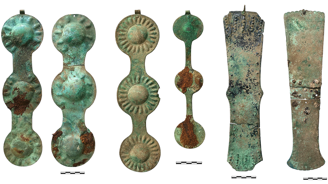 several decorative bronze horse bridle fittings