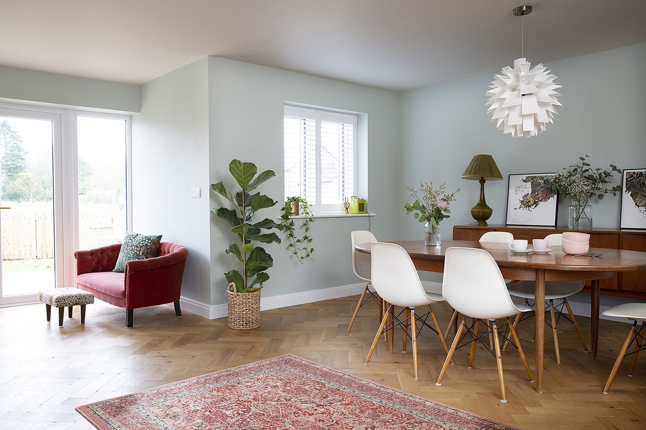 wood floor cleaner: Open plan dining room with wooden flooring and mid-century furniture