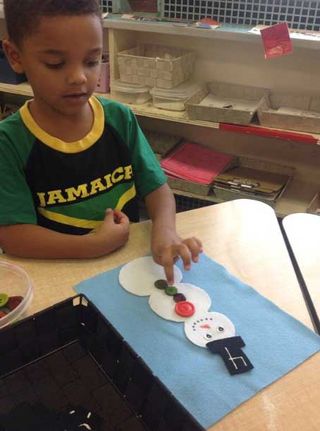 An elementary student at Greater Essex County District School Board engages in a number-learning activity.