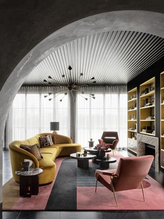 black, mustard and pink living room