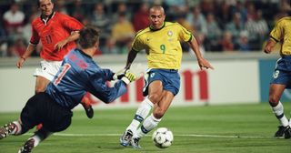 Ronaldo and the Netherlands' goalkeeper Edwin van der Sar during the 1998 FIFA World Cup semi-finals, Brazil vs Netherlands.