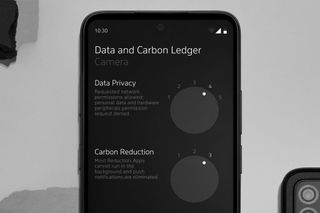 Punkt. MC02 Smartphone with privacy and carbon reduction notifications on screen