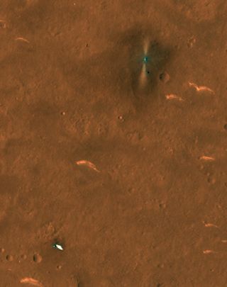 The parachute and backshell for China's Zhurong Mars rover are visible at lower left in this image, captured on June 6, 2021 by the HiRISE camera on NASA's Mars Reconnaissance Orbiter.