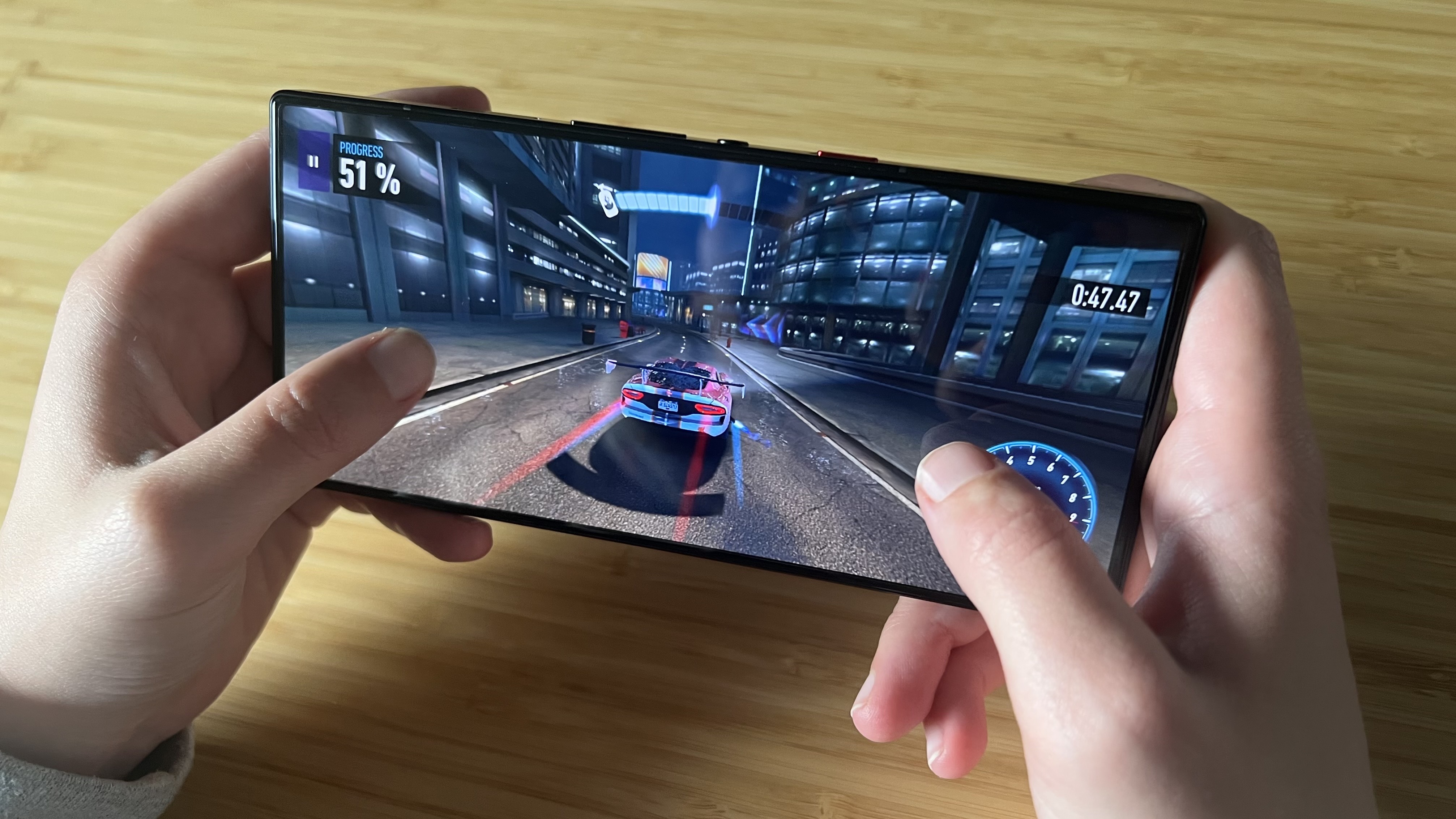 Reviewer playing Need For Speed: No Limits on RedMagic 9S Pro gaming phone