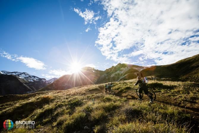 Riders walk up a climb on the way to another timed segment
