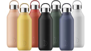 7 colourful Chilly's water bottles on a white background