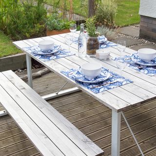 Whitewashed picnic table and benches