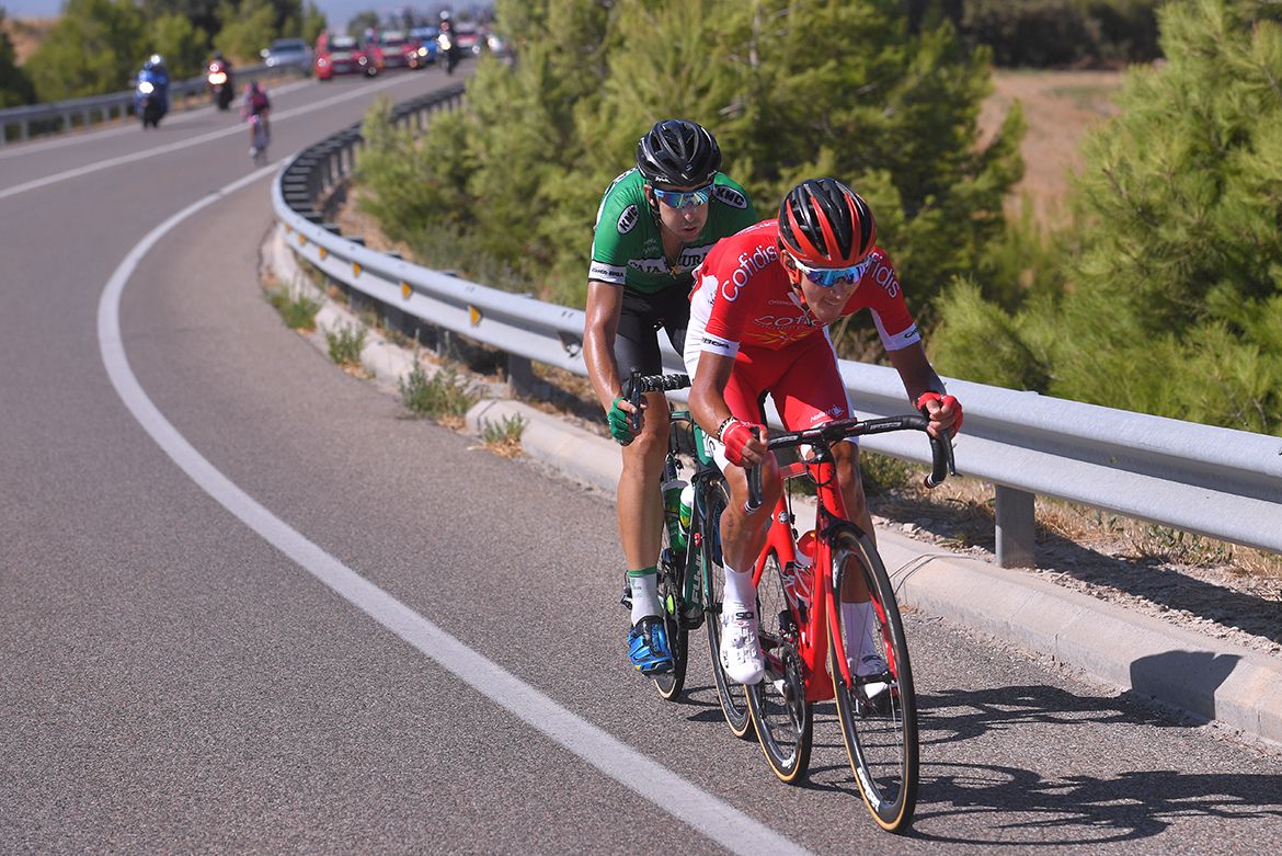 Stephane Rossetto and Diego Rubio try to hold off the peloton