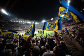 Inter fans wave flags at the Santiago Bernabeu ahead of the 2010 Champions League final in May 2010.