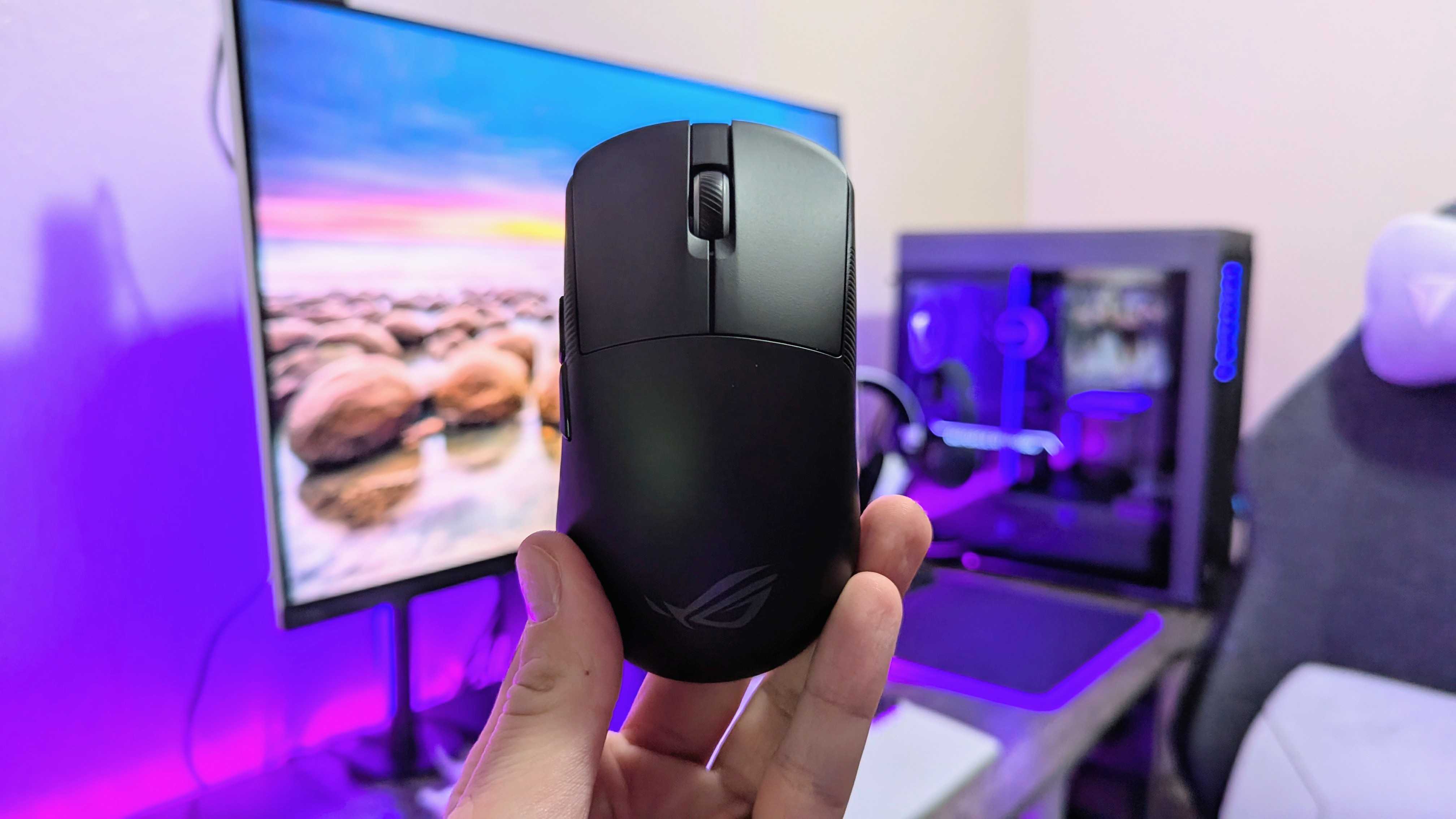 Image of the ASUS ROG Harpe Ace Mini wireless gaming mouse.