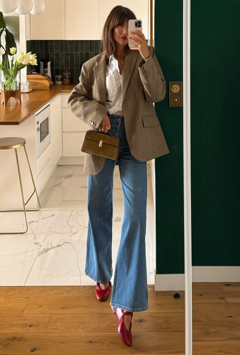 @juliesfi wears light-wash flare jeans with a check blazer, white shirt and red Mary-Janes