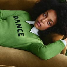 a model wears a green dance jumper from the bella freud M&S collection