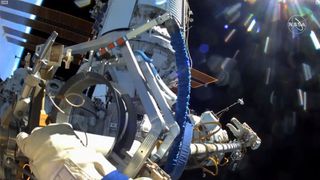 Russian cosmonaut Oleg Novitsky can be seen at the end of the 46-foot-long (14 meters) Strela crane during a seven-hour spacewalk conducted on Wednesday, June 2.