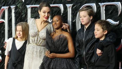 Angelina Jolie poses with her children on the red carpet upon arrival for the European premiere of the film &quot;Maleficent:Mistress of Evil&quot; in London on October 9, 2019