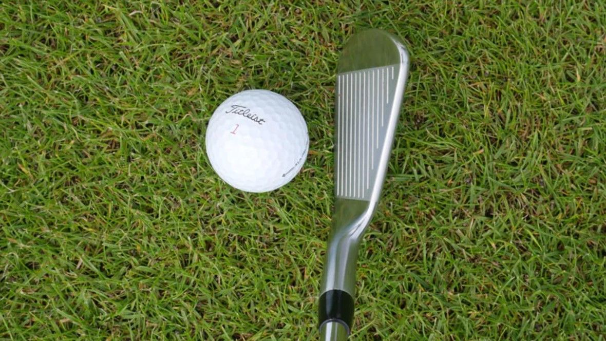 The Titleist T100s iron at address