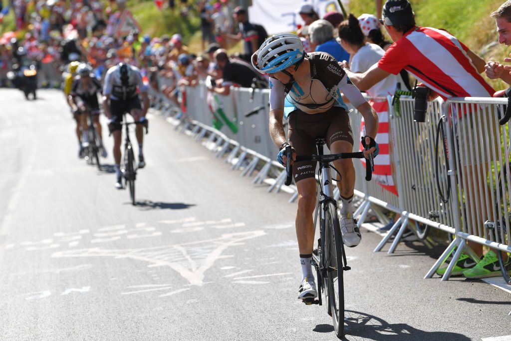 Romain Bardet (AG2R) is reeled in by Chris Froome