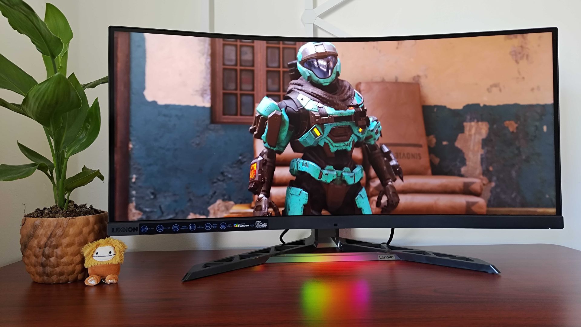 Lenovo Legion Y34wz-30 with Halo Infinite multiplayer gameplay on screen with Spartan in middle